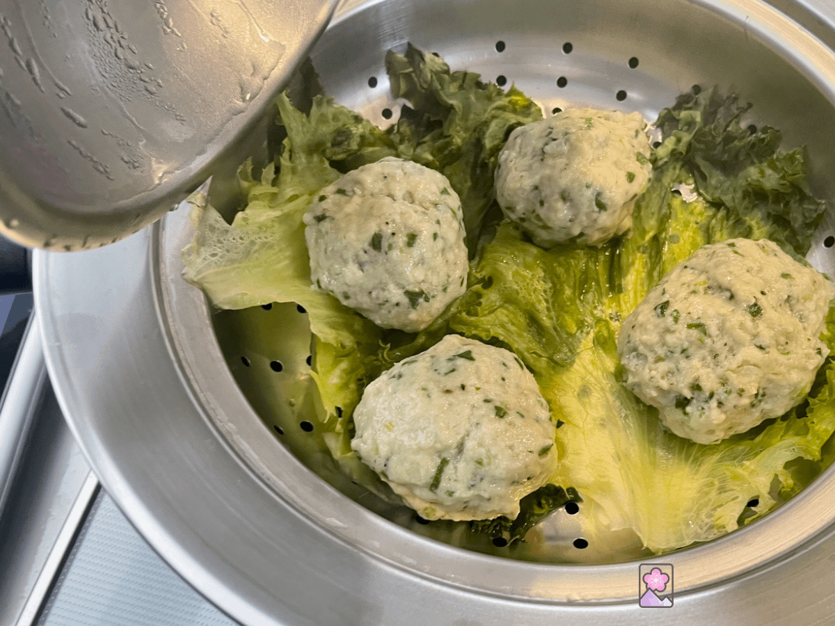 Dim sum style Steamed Meatballs I’m a steamer on a bed of lettuce