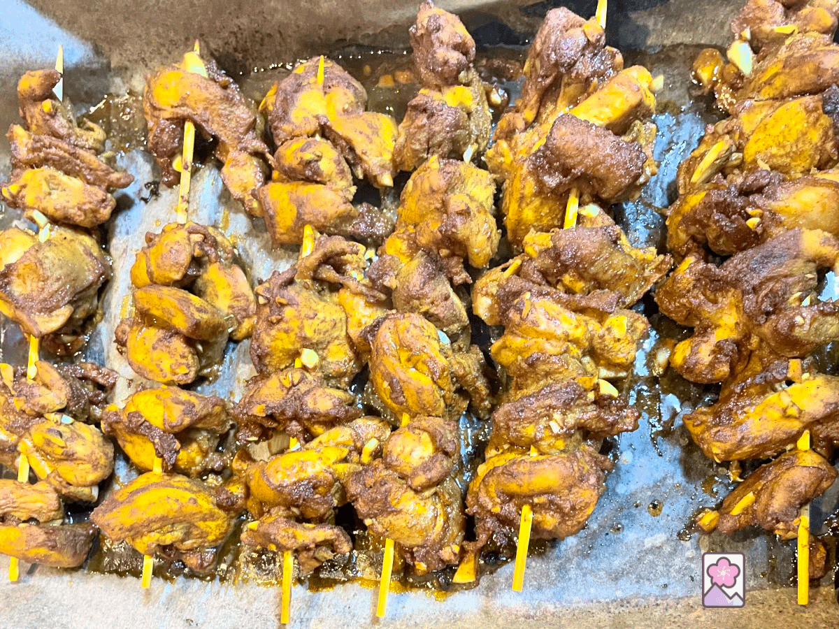 Six succulent skewers of Chicken Shawarma served fresh out of the oven
