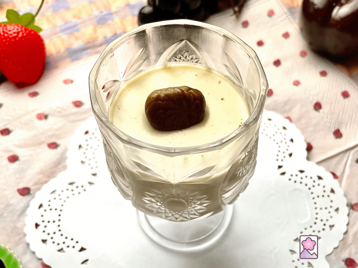 Chestnut Panna Cotta in a glass goblet topped with a half chestnut