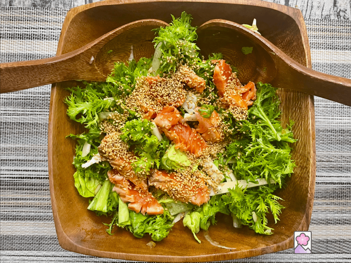 Japanese Salad with Onion Vinaigrette dressing in a wooden salad bowl ready for serving.