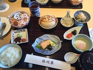 Kaiseki ryori - many small dishes of food and drink served on a tray