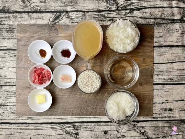 Ingredients for Risotto with prep work complete- onions chopped, cheese shredded, etcetera