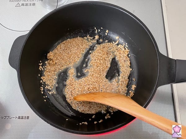 Sauté the sesame seeds in butter.