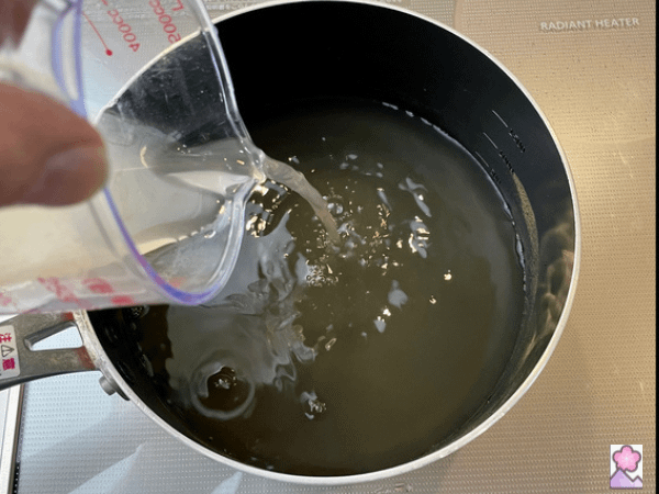 Prepare Dashi for Ochazuki by heating liquid in a pot