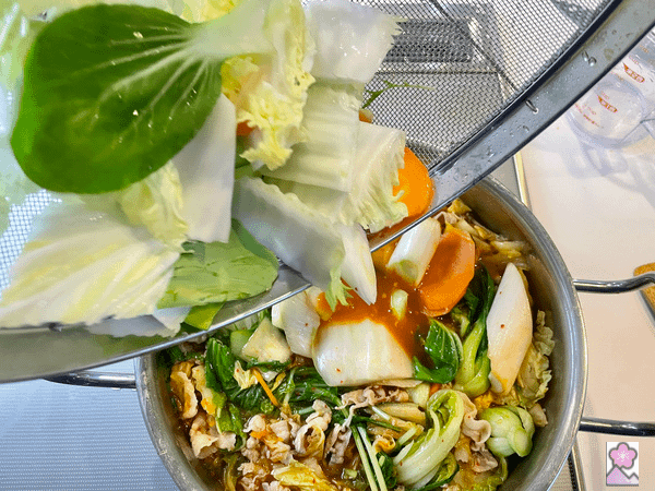 Stir in and cook down green veggies