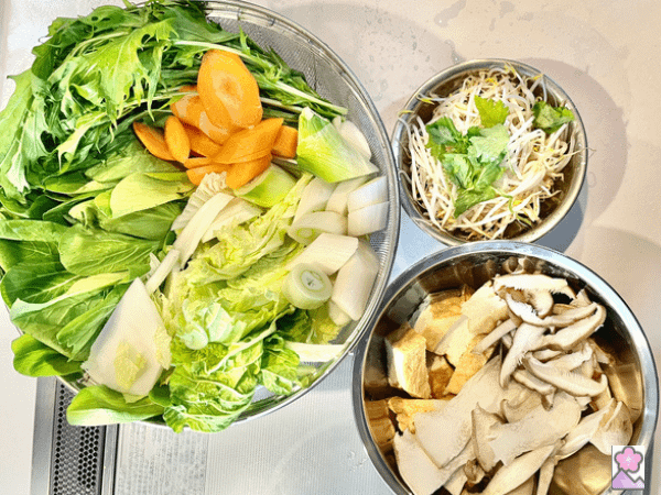 Kimchi Nabe Vegetables in three bowls