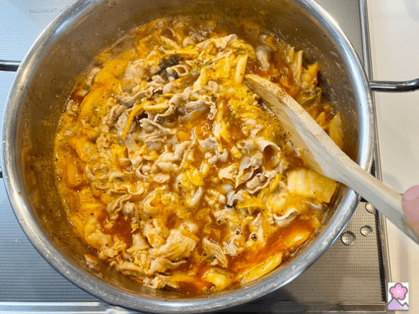 Pork and kimchi boiling in soup