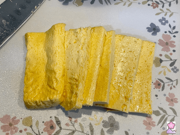 Sliced omelette on a cutting board
