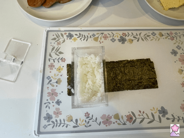 Musubi Maker half filled with white rice