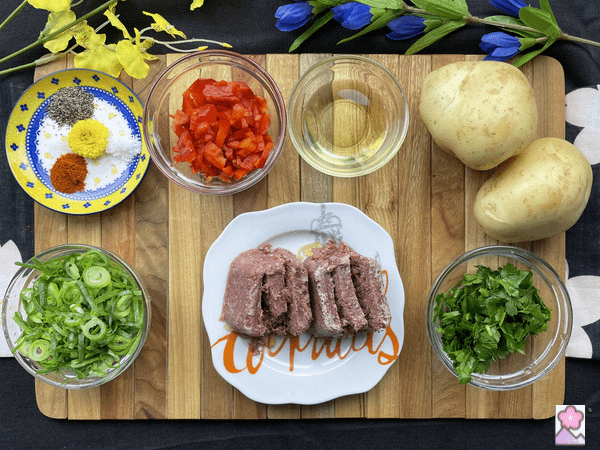 Ingredients for Savory Corned Beef Hash On a wooden placemat