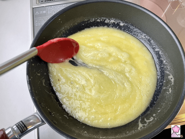 Stirring the toffee mixture as it gradually darkens
