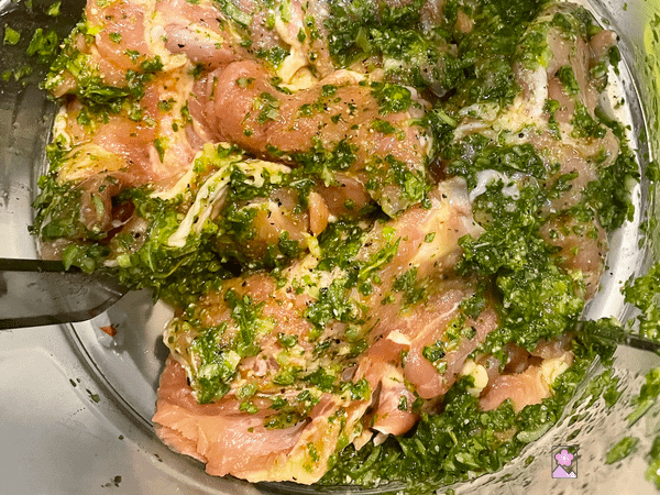Marinated chicken in a -plastic container