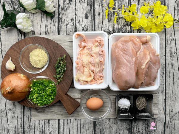 Ingredients for chicken loaf on a board