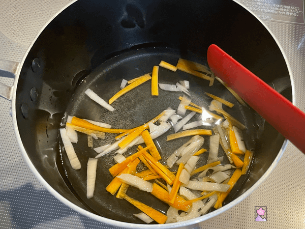 Sushi Vinegar cooked with veggies in a frypan
