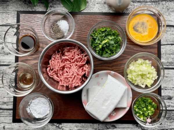 Dim Sum Style Steamed Meatball Ingredients on a wooden board.