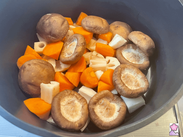 Mushroom, carrot and renkon chopped up prior to cooking in the pot and ready add the dashi
