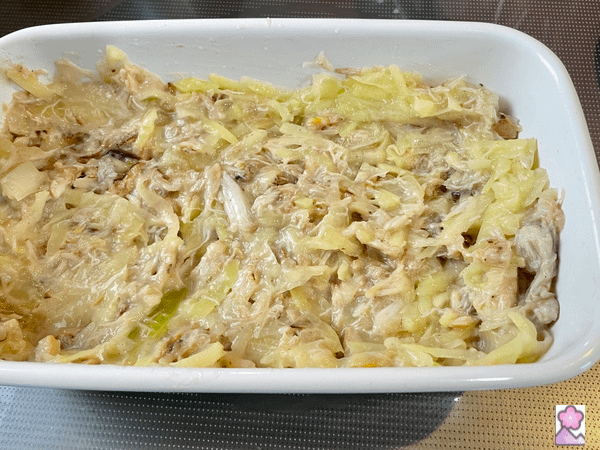 Crab mixture is filling a casserole dish halfway to the top