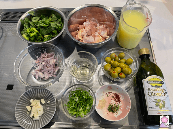 Chicken and Olive Paella Ingredients after prep work Laid out in bowls