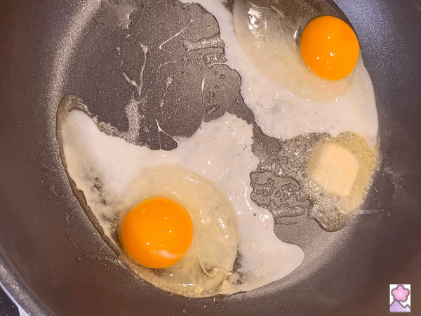 Two Eggs cooking in a fry pan