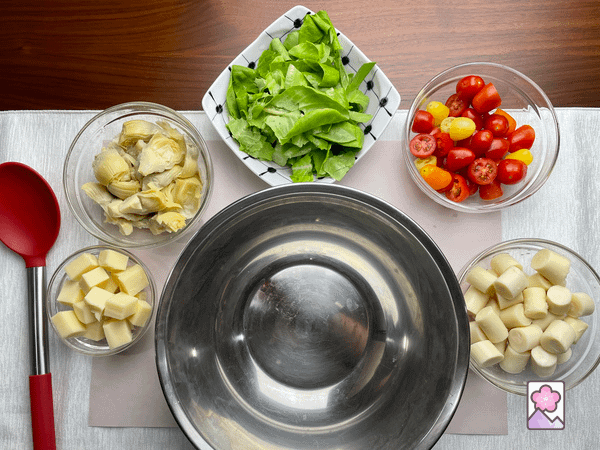 Hearts of Palm Salad ingredients ready to mix in a large salad bowl