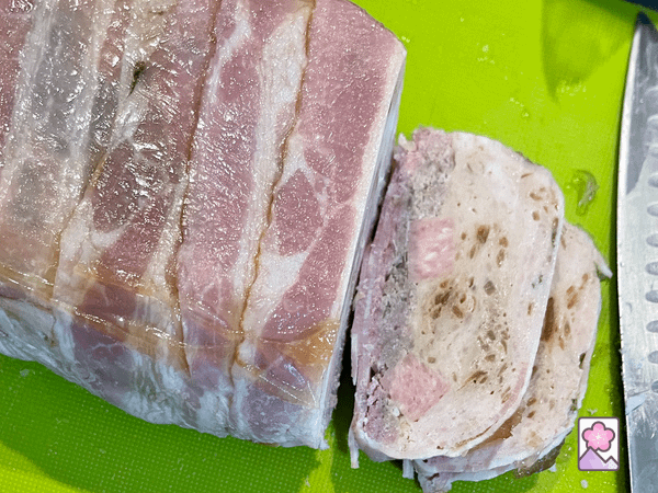 Sliced terrine on a cutting board