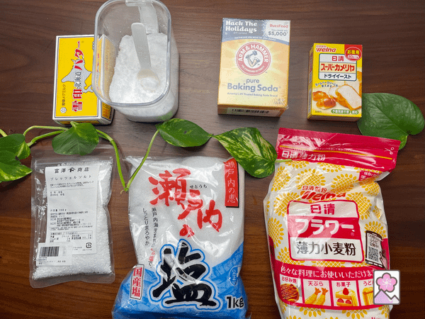 Ingredients for soft pretzels, lined up on a table