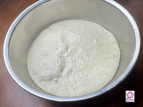 Dough in a bowl after rising