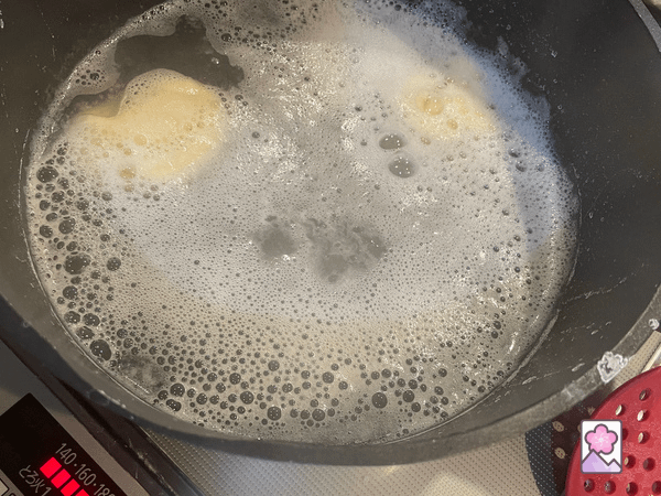 Pretzel dough in boiling water