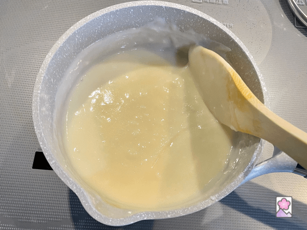 Stirring butter and flavoring into the pudding