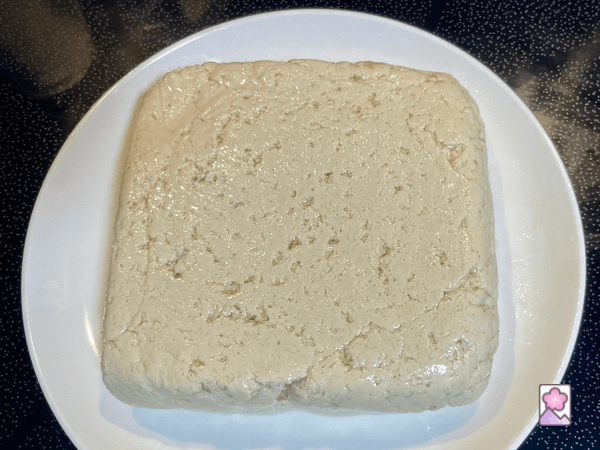 A block of goma tofu after setting