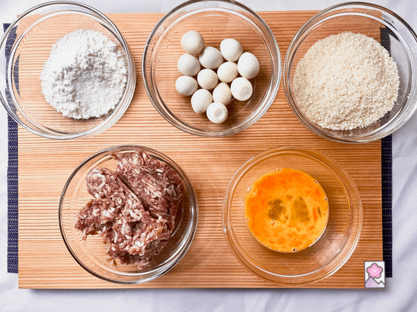 Mini Scotch Egg Ingredients on a wood board