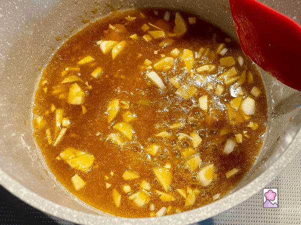 Preparing Japanese Fish Sauce by cooking in a saucepan