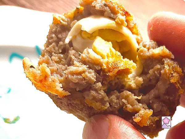 Biting into a Mini Scotch Egg