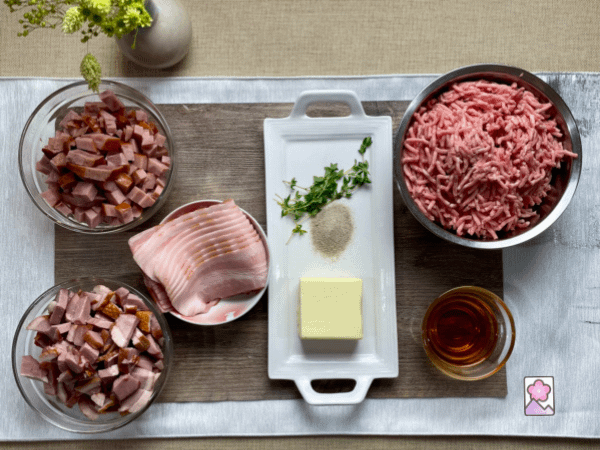 Spreadable Roast Pork and Duck Pate ingredients on a board