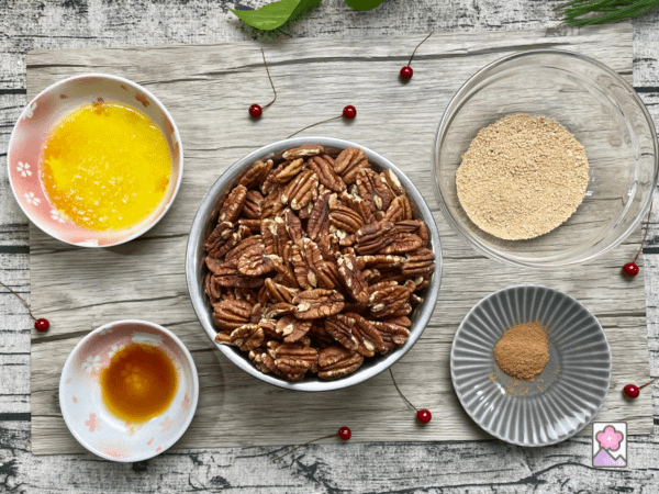 Maple Glazed Pecans ingredients on a wood table