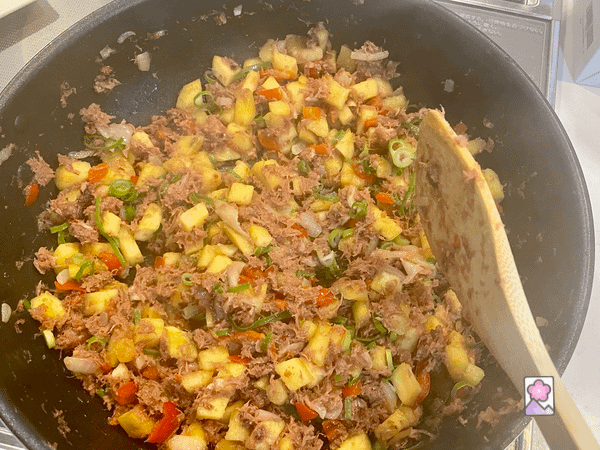 Corned Beef Hash with Japanese Sweet Potatoes in a skillet