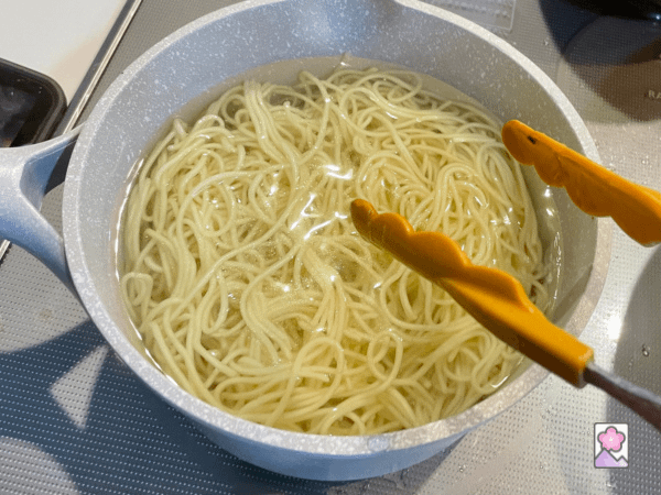 Boiling Chukka Ramen noodles in a saucepan