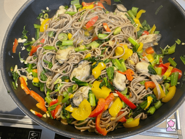 Spicy Oyster Yakisoba finished off in a large skillet