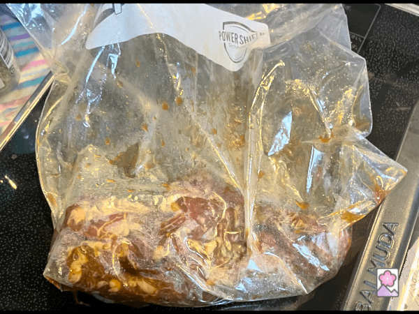 Bacon marinating in a ziplock bag