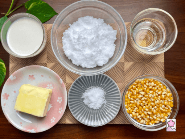 Caramel Popcorn Ingredients lined up on a board