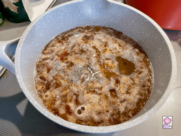 Katsuobushi boiling over a low flame in a saucepan