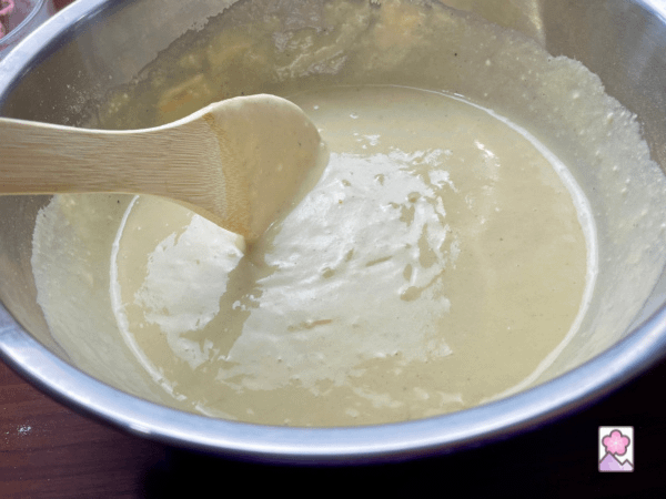 Vichyssoise potato pancake batter in a metal mixing bowl