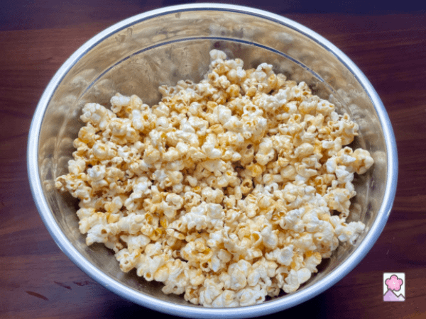 Caramel popcorn in a metal bowl