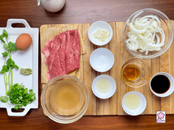 Ingredients for Beef Donburi on a wooden board