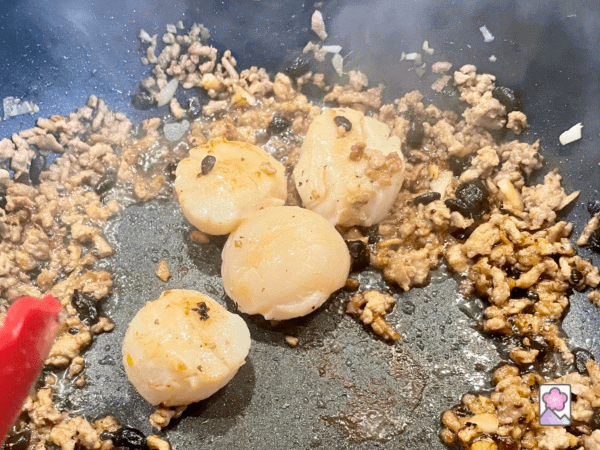 4 scallops in the skillet with ground pork mixture