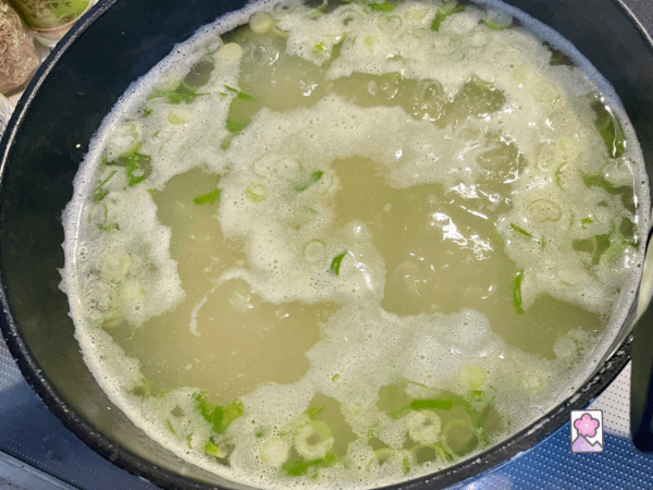 Boiling Beefun in Chicken Broth and Scallions
