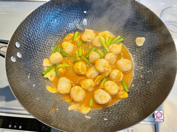 Scallops simmering in spicy Garlic Sauce