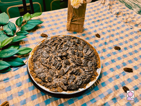 Cooled Pecan Pie sitting on the table ready for slicing