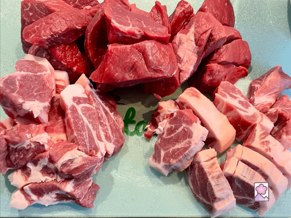 Fresh chunks of pork belly and lean beef go into this homemade bologna