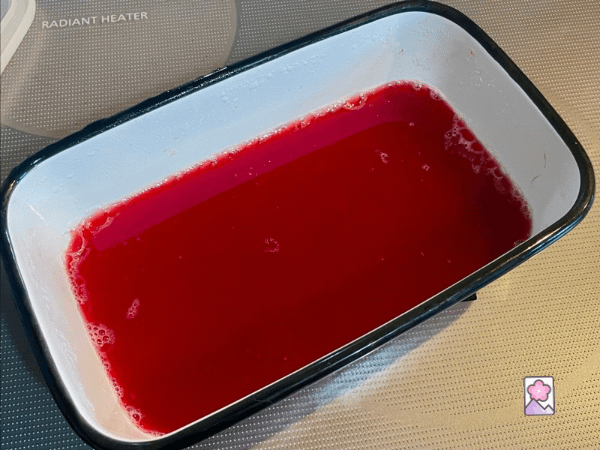 Raspberry Gelatin hardens up in a non stick rectangular pan